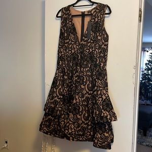 Very pretty black lace over nude dress